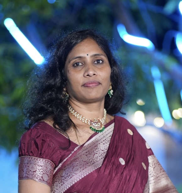 Mrs. Anusha Vookanti, owner of Sri Varsha Beauty Parlour